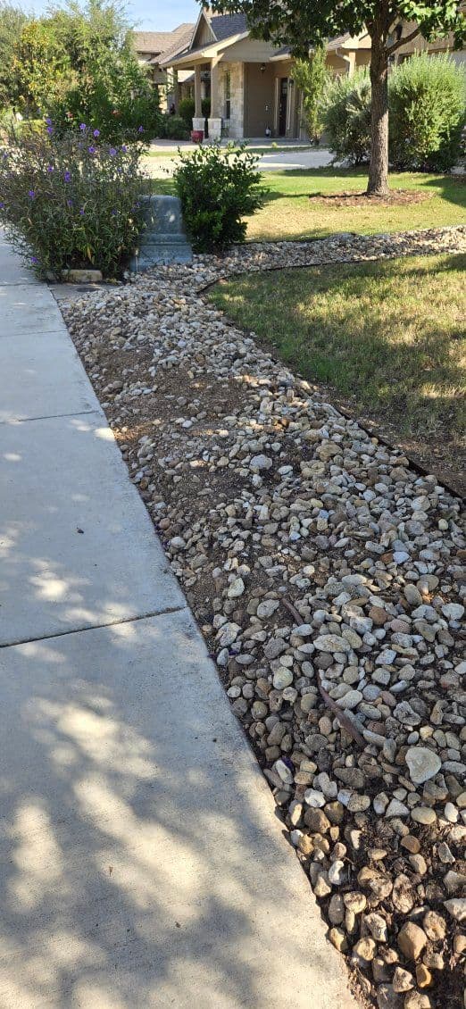 Project Stunning Rock Flowerbed Transformation in Rancho Sienna image